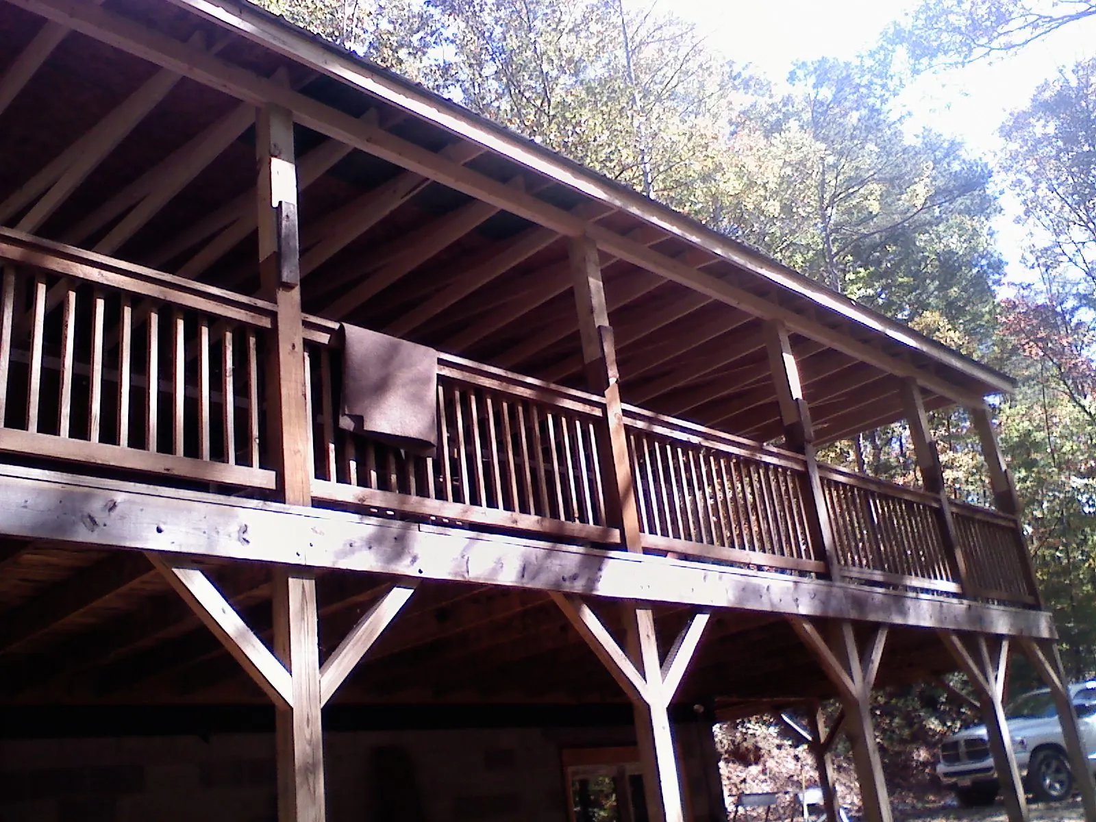 Timber framing under a new elevated porch and deck — Roof Leak Repair in Cartersville by Roofing Brothers